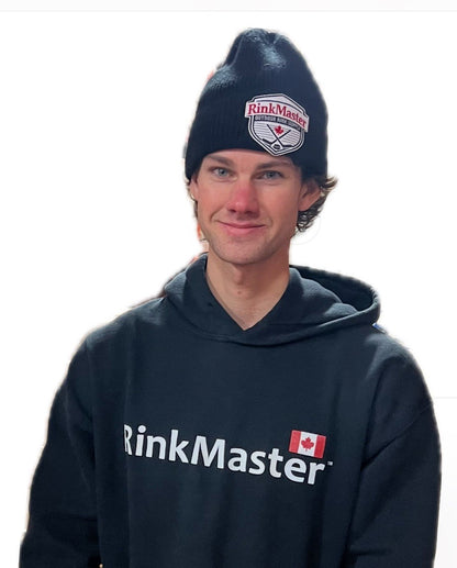 Person wearing a navy hoodie and beanie with 'RinkMaster' branding on a white background